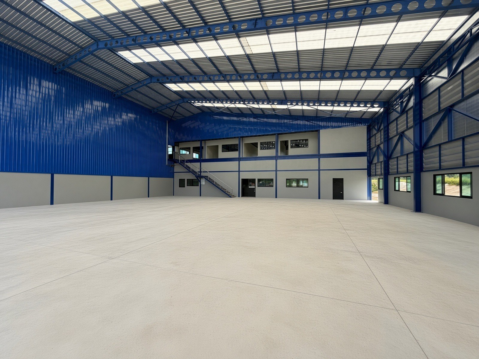 Interior of new hangar bay looking toward mezzanine