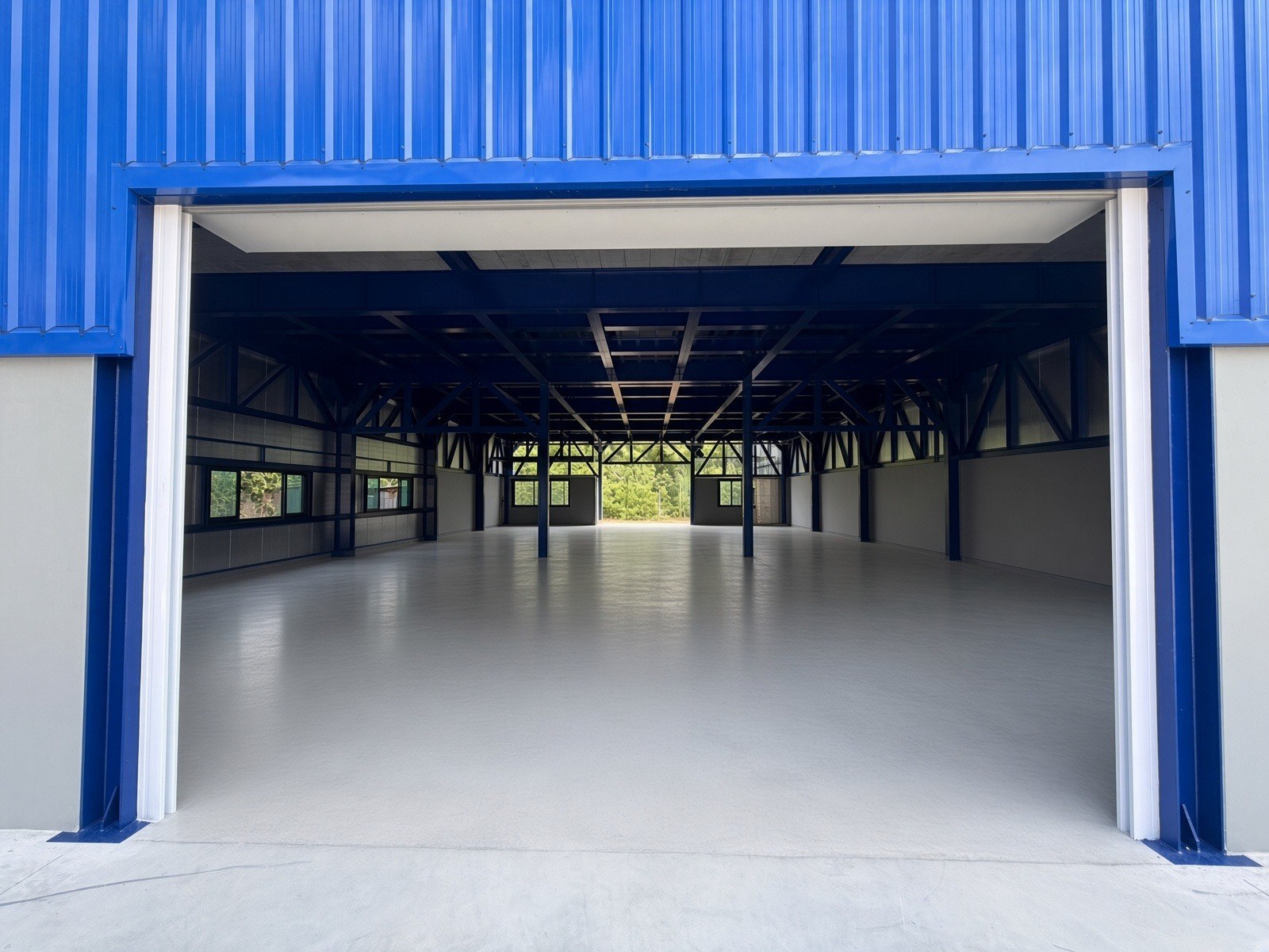 Looking into workshop bay from outside